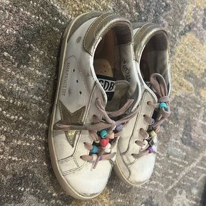 Used Size 32 golden goose w/ metallic stars & beaded laces! So precious!
